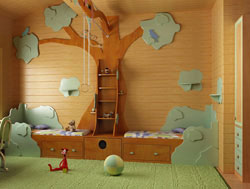 В игровой зоне детской комнаты рекомендуется стелить ковер или ковровое покрытие